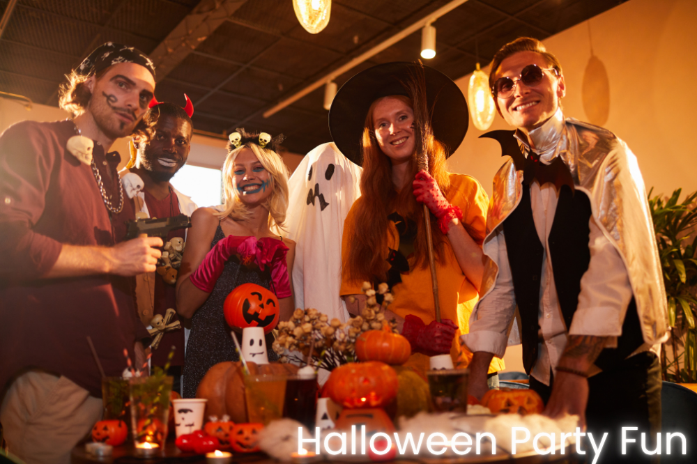 Adults playing Halloween party games and having fun in costumes